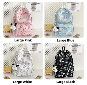 Detail of nylon backpacks with star patterns and dog plush charms in four colors