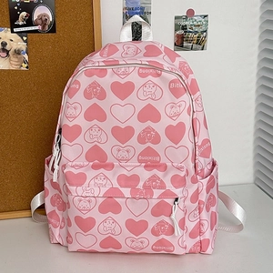 Pink nylon backpack with heart bear patterns and front zipper pocket for school
