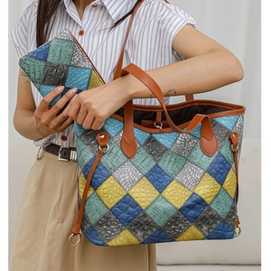 Fashionable multi-texture patchwork tote bag with crocodile and ostrich grain leather