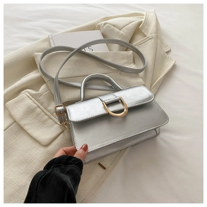 Chic silver metallic PU leather handbag with gold D-buckle and adjustable shoulder strap