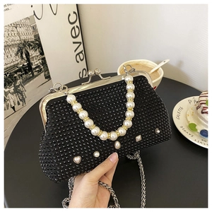 Sparkling black rhinestone dinner bag with faux pearl handle and silver kiss lock closure