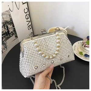 Elegant white rhinestones evening clutch bag with heart pearl details and silver chain strap