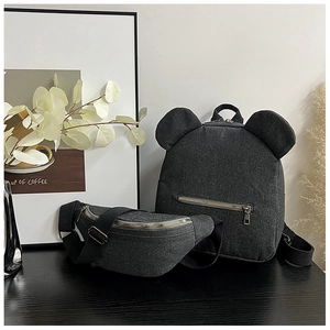 Minimalist black denim canvas backpack and waist bag set with round ear design
