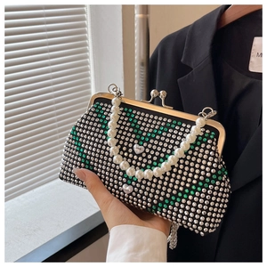 Sparkling rhinestone crossbody evening bag with pearl handle and heart-shaped patterns