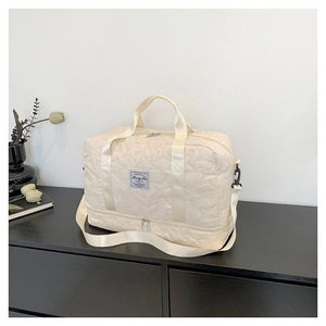 Chic beige quilted crossbody bag with star pattern and separate shoe compartment