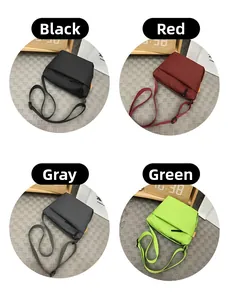 Detail view of nylon crossbody bags in black, red, grey, and green with wide straps
