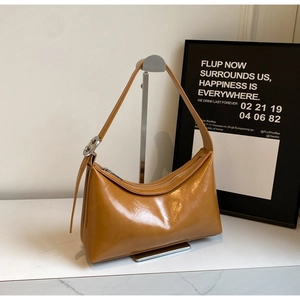 Chic caramel brown PU leather baguette shoulder bag with silver hardware for women