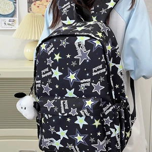 Minimalist black nylon backpack with star pattern and cute plush dog pendant charm