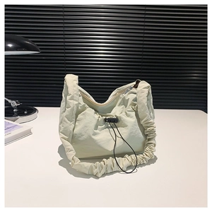 Chic pleated cream cloud crossbody bag with soft gathered shoulder strap for daily casual use