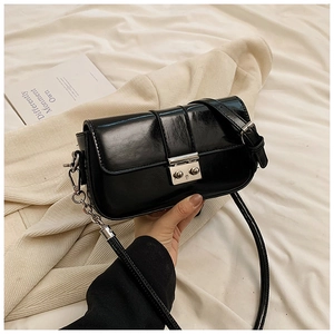 Modern black glossy PU leather crossbody bag with silver twist lock and metal chain strap