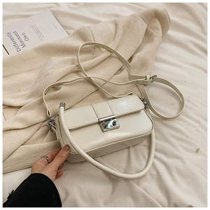 Minimalist cream white PU leather crossbody bag with silver lock and dual straps