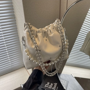 White pleated cloud handbag with pearls, silver studs and chain shoulder strap for women