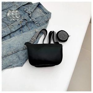 Minimalist black PU leather crossbody bag with geometric V-pattern wide shoulder strap