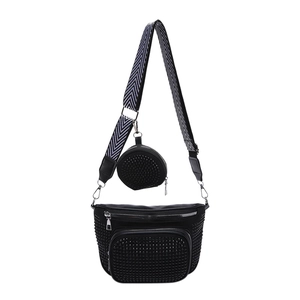 Black PU leather crossbody bag with studded details and chevron pattern strap