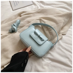 Light blue PU leather crossbody bag with decorative bow and detachable long strap