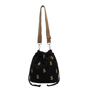 Sac seau tendance en toile noire avec broderie dollar dorée et large bandoulière marron