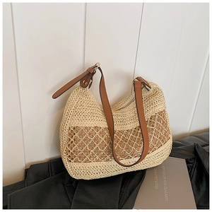 Chic woven straw handbag with brown leather strap and hollow mesh design for summer