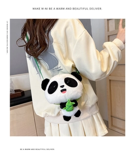 Close-up of plush panda crossbody bag featuring soft faux fur and bamboo accessory detail