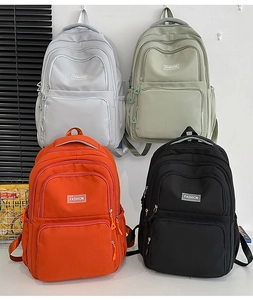 Detail showing the four available colors of the versatile nylon fashion backpack collection