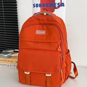 Sac à dos en nylon orange vif pour femme avec plusieurs poches zippées et style tendance