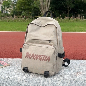 Chic khaki nylon backpack for women with large front pocket for outdoor and casual travel use