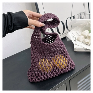 Detail of purple woven tote bag showing diamond mesh texture and rope knot craftsmanship