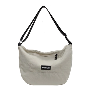 Minimalist beige moon shaped hobo crossbody bag with adjustable black fashion strap