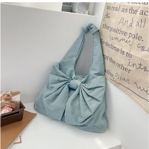 Sac fourre-tout en denim bleu clair avec grand nœud et poignées nouées pour femme