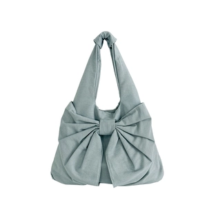 Sac à main minimaliste en denim d'été avec grand nœud en toile bleu clair élégant