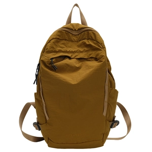 Urban outdoor washed fabric backpack in ginger yellow with FLY10 embroidery