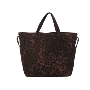 Minimalist canvas tote bag with brown leopard print and dual handles for women