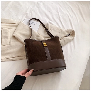 Brown faux suede and PU leather bucket bag with golden metal lock and long strap