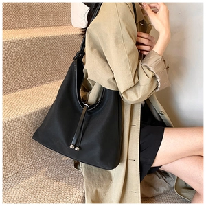 Chic black PU and frosted fabric hobo bag with trendy knot strap and silver charms