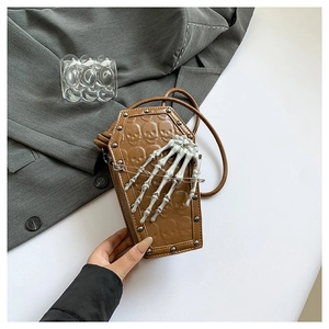 Unique brown coffin shaped PU leather crossbody bag with skull embossing and rivets