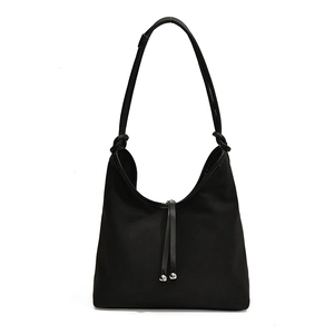 Minimalist black PU leather crossbody bag with knot shoulder strap and silver beads