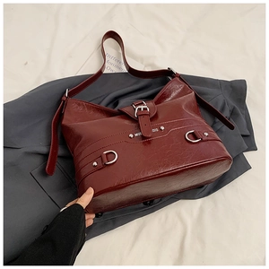 Fashionable deep burgundy PU leather shoulder bag with vintage texture and silver buckles