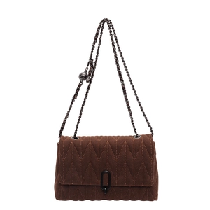 Brown faux suede crossbody bag with V-quilted pattern and metallic chain strap