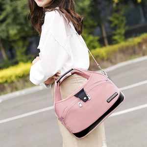 Sac à bandoulière rose en nylon imperméable pour femme avec bandoulière réglable