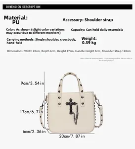 Detail view of cream PU crossbody bag showing dimensions 20x17x6cm and metal cross decor