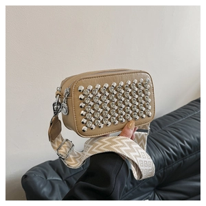 Chic beige PU leather crossbody bag with silver studs and wide jacquard strap