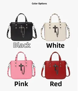 Detail view of gothic PU leather crossbody bags with metal cross charms and studs in four colors
