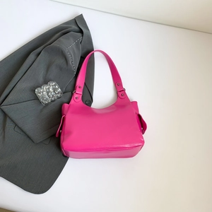 Stilvolle rosane Handtasche aus PU-Leder mit Litschi-Struktur und breitem Trageriemen