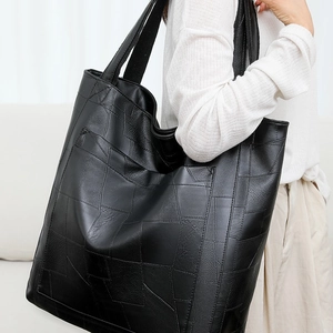 Minimalist black PU leather tote bag with geometric patchwork design for women