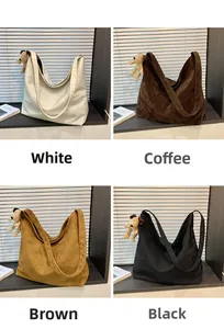 Detail view of large tote bags in four colors with cute plush dog pendants decoration