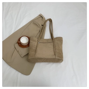Minimalist khaki faux suede tote bag with front zipper pocket for daily fashion