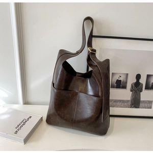 Classic dark brown PU leather tote bag with dual front pockets and adjustable gold buckle