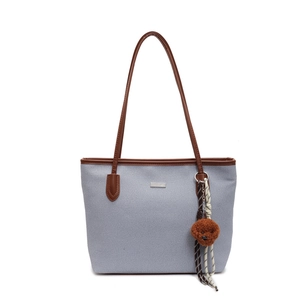 Fashionable denim PU tote bag in light blue and brown with a cute plush puppy pendant