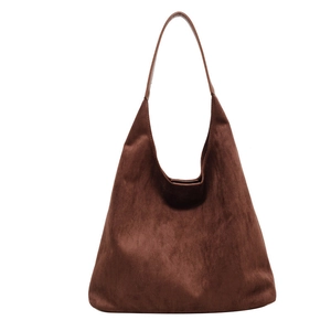 Minimalist brown suede tote bag with leather shoulder strap for casual autumn style