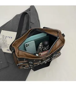 Interior view showing the large capacity of the rivet tote bag with daily essentials