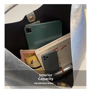Detailed view of the spacious internal capacity of this stylish textured PU tote bag
